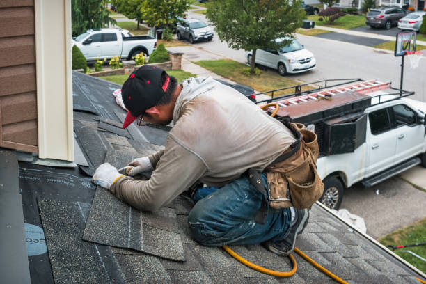 Professional Emergency Roof Repair technician working in Glenville, WV